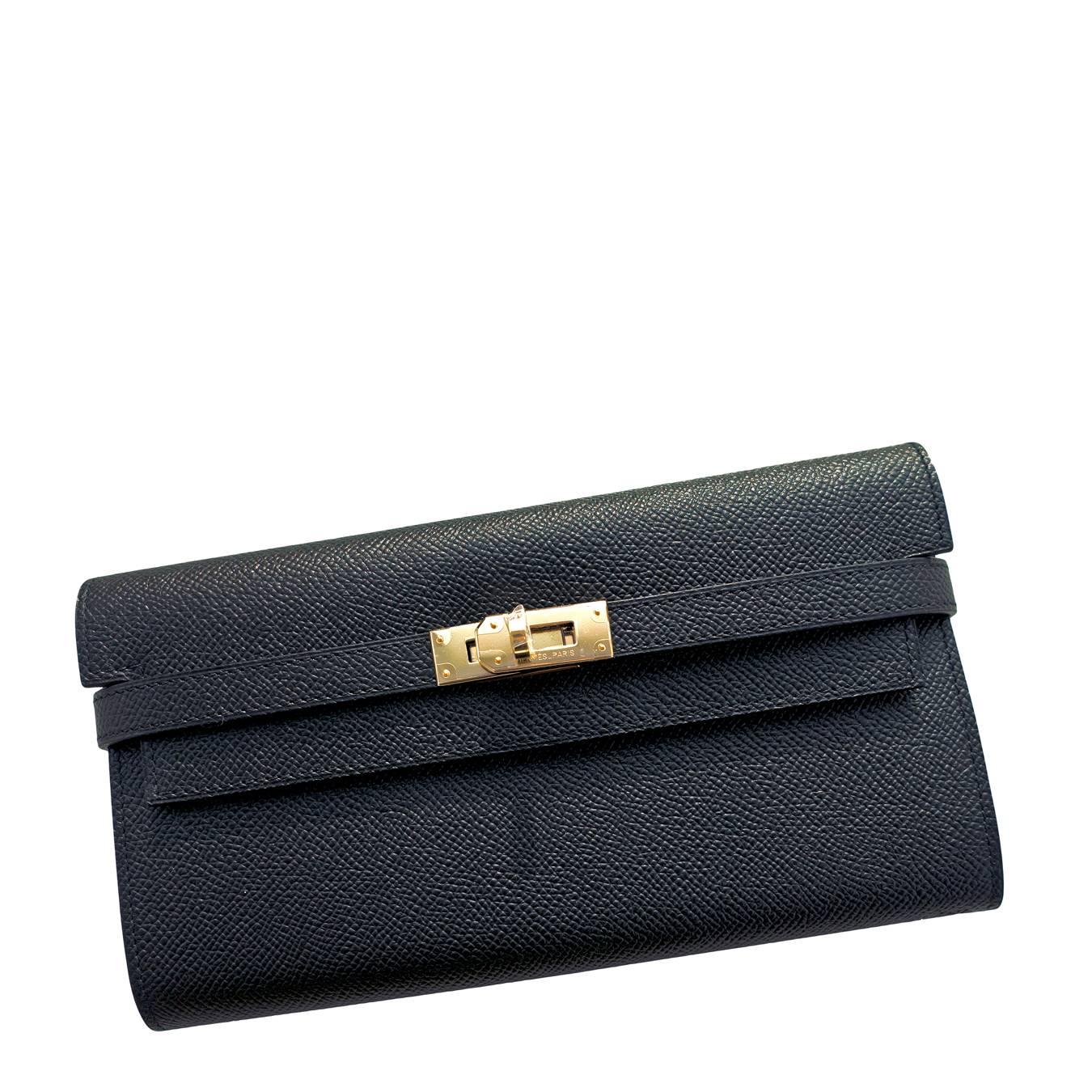 Hermes Black Epsom Kelly Long Wallet Clutch Permabrass Super Rare
Store Fresh. Pristine Condition.
Perfect Gift coming full set with Hermes box and ribbon
So incredibly rare with Permabrass Hardware!
The black Epsom Hermes kelly wallet is our