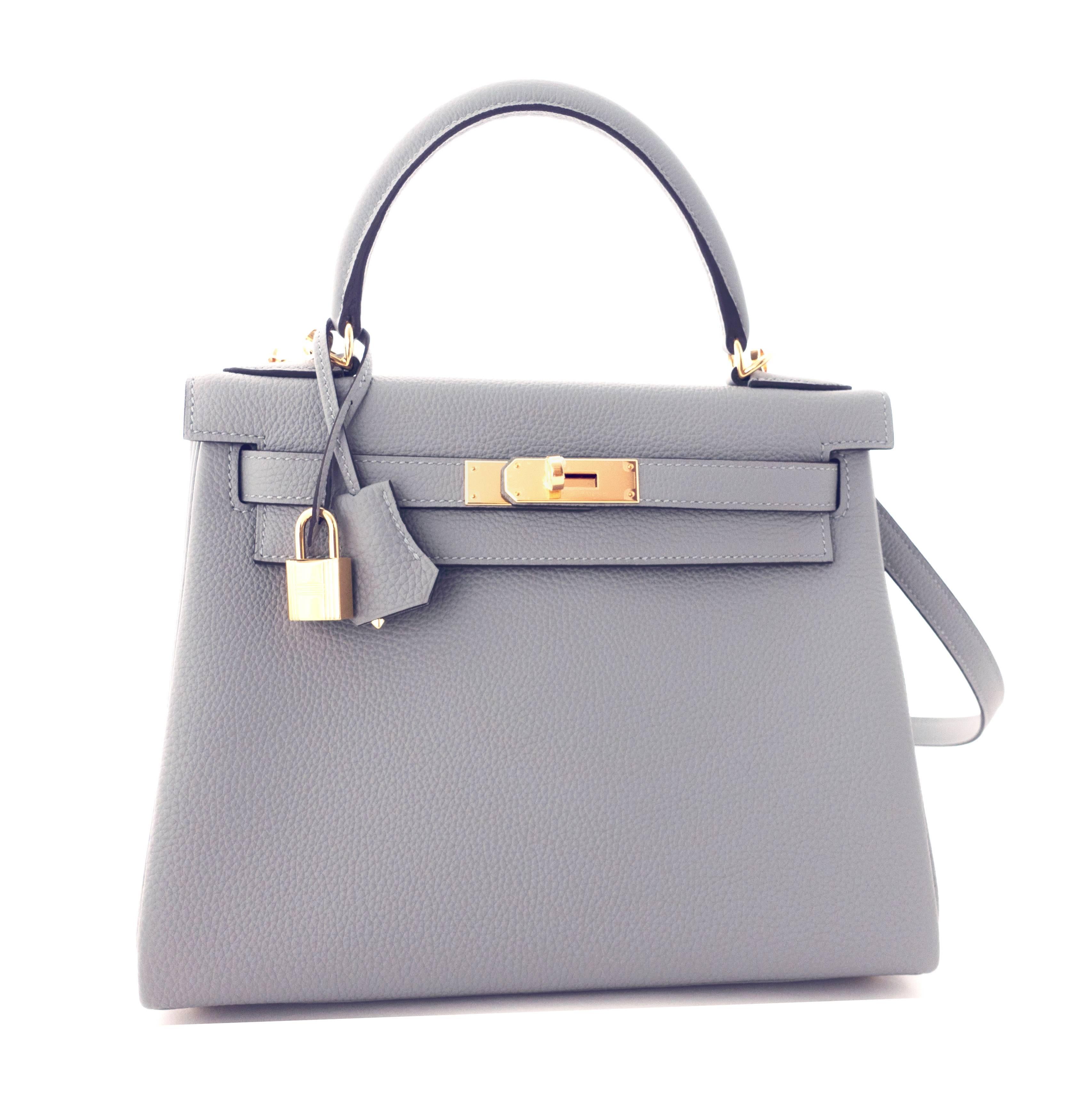 Hermes Gris Mouette New Grey 28cm Togo Kelly Bag Gold Hardware Superb
Brand New in Box.  Store fresh. Pristine condition (with plastic on hardware). 
Just purchased from Hermes store in 2016 with new interior X Stamp. 
Perfect gift! Comes with