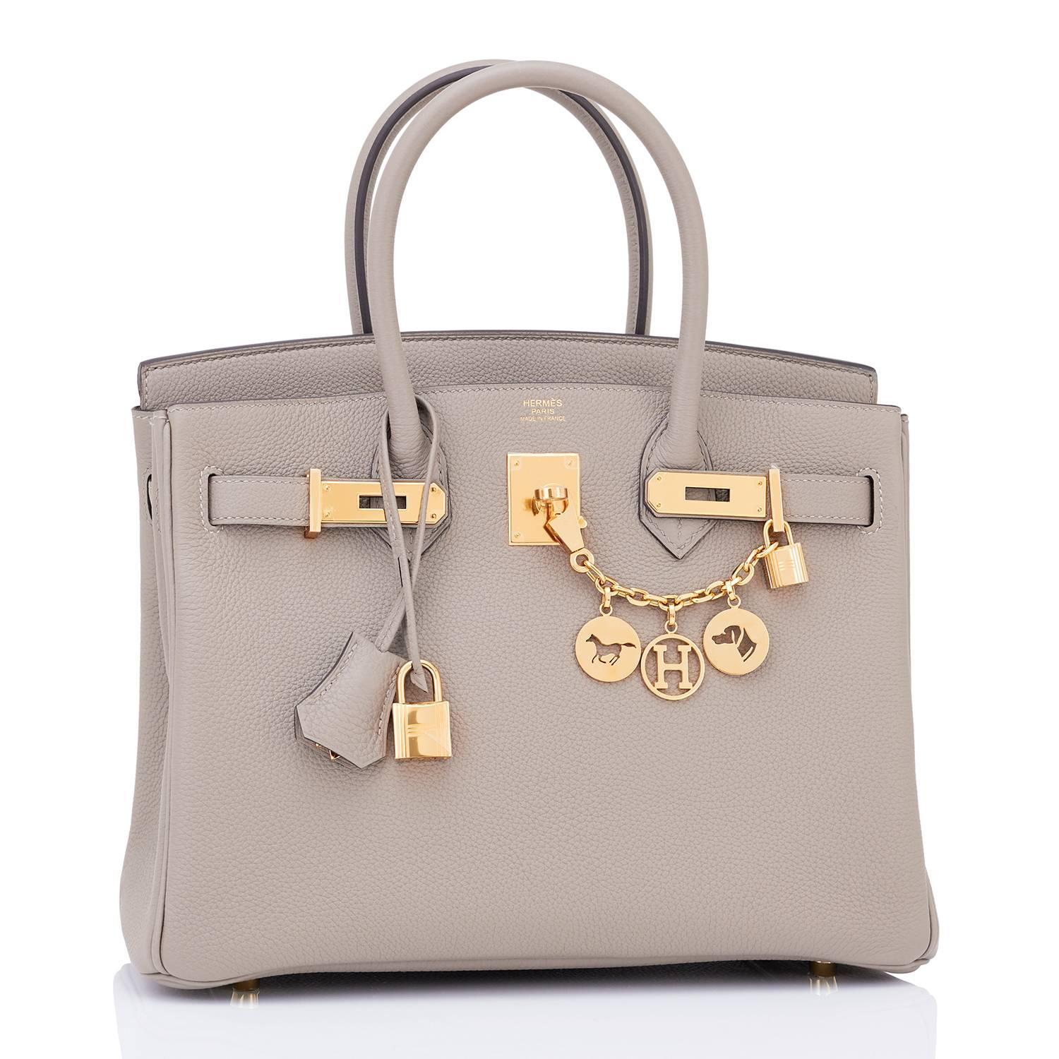 Devastatingly gorgeous!  Gris Asphalte is the best neutral to come from Hermes in many years.
New or Never Worn. Pristine Condition (with plastic on hardware). 
Perfect gift! Comes in full set with lock, keys, clochette, sleeper, raincoat, and