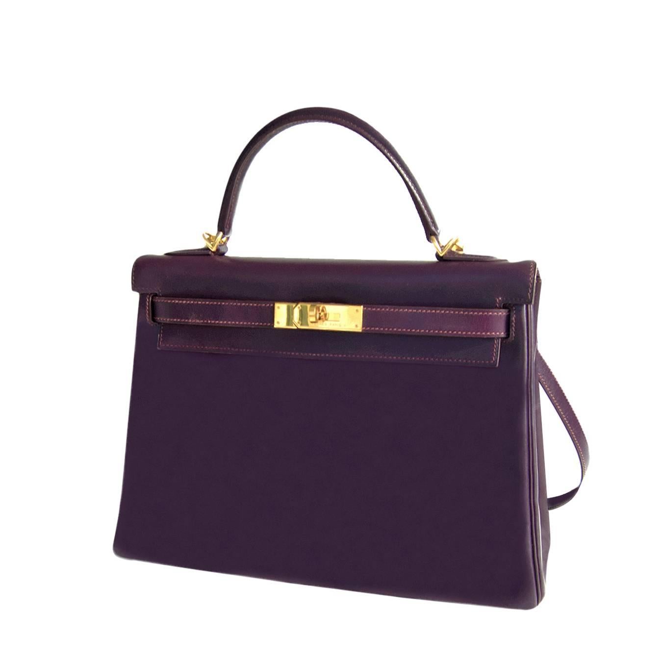 Hermes Raisin Box Kelly Retourne 32cm Gold Hardware GHW Shoulder Bag
Raisin in Box Leather is a very sought-after color
A fabulous purple that is bright but very versatile 
The Box leather is in fabulous condition with a gorgeous patina
So