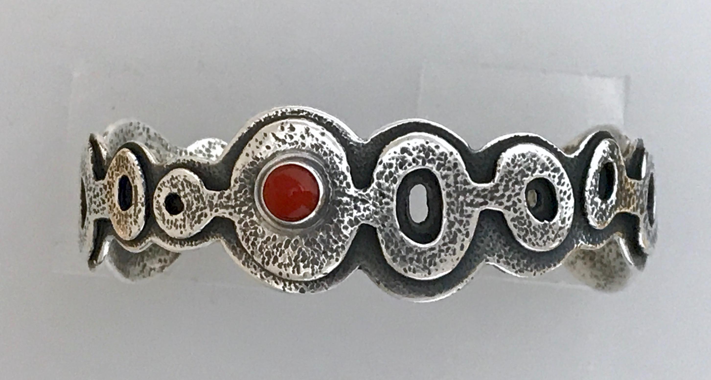 Cast sterling silver bracelet with red Italian coral cabochon. 5.5