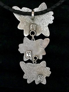 Kitty drop necklace pendant, Melanie Yazzie Navajo cast silver cats silver black