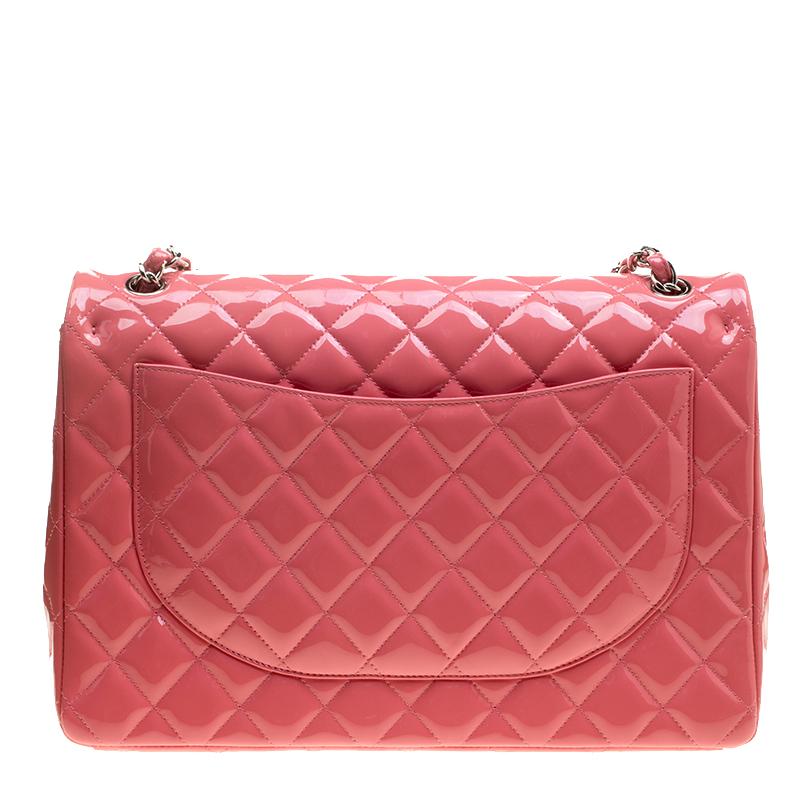 Chanel's Flap bags are the most iconic handbags. The classic double flap bag is crafted from leather and features the iconic quilted pattern. It has a chain and leather interwoven strap along with the CC twist lock closure in silver tone. The flap