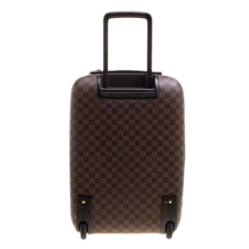 When you are travelling light, travel with style with the Louis Vuitton Damier Ebene Canvas Pegase Light 55 Luggage. Light and luxurious, it includes a modernized design with increased volume and lighter lining. Sleek and chic, it is the prefect