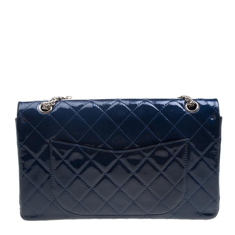 Crafted with precision from patent leather, and touched with a blue shade, this Reissue 2.55 Flap bag from Chanel cannot get any luxurious than it already is! As is the design with almost all the Reissue pieces, this bag brings the signature
