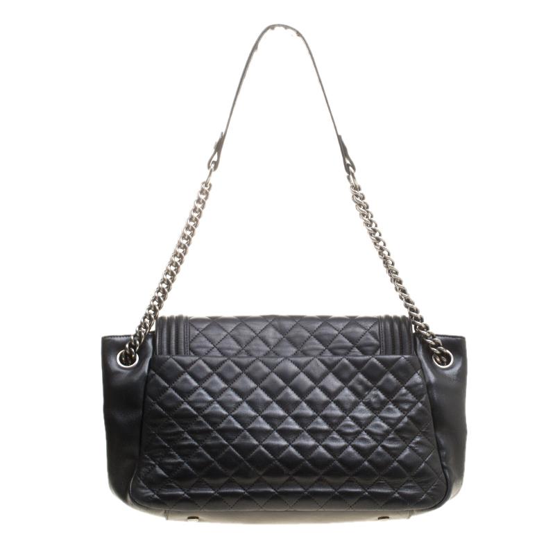 An impeccable pick of the season is this contemporary flap bag with remarkable features. It is from Chanel, and it is a grand mix of their Boy Flap and their Accordion bags. The bag comes in leather with their signature quilt pattern, and it