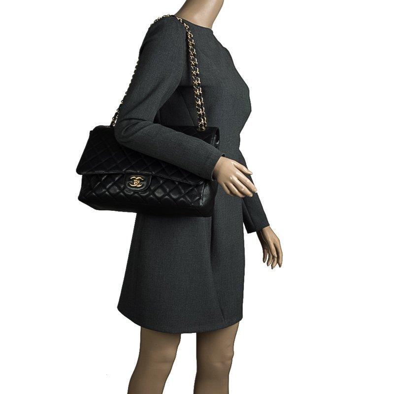 Chanel Black Quilted Caviar Leather Maxi Classic Flap Bag In Good Condition In Dubai, Al Qouz 2