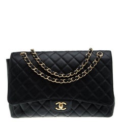 Chanel Black Quilted Caviar Leather Maxi Classic Flap Bag