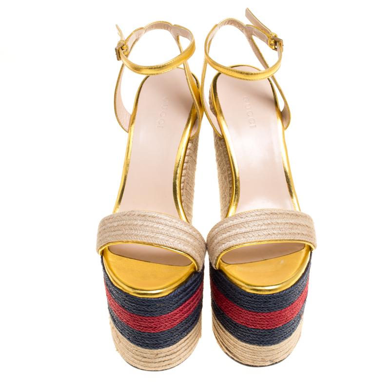 We adore this pair of sandals from Gucci as it brings a smooth mix of fashion and edge. Set of espadrille wedges with their web detailing, the sandals feature single front straps and ankle fastenings. They are gorgeous and just right to nail a