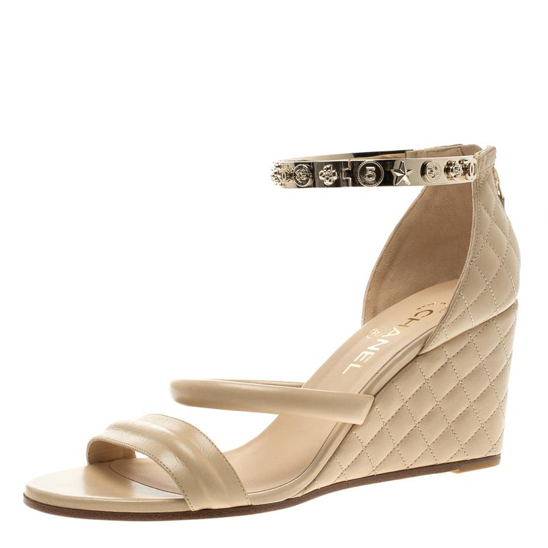 Chanel Beige Quilted Leather Charm Embellished Ankle Cuff Wedge Sandals Size 40.