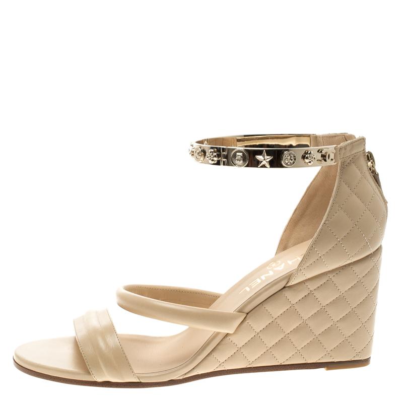 Chanel Beige Quilted Leather Charm Embellished Ankle Cuff Wedge Sandals Size 40. 1