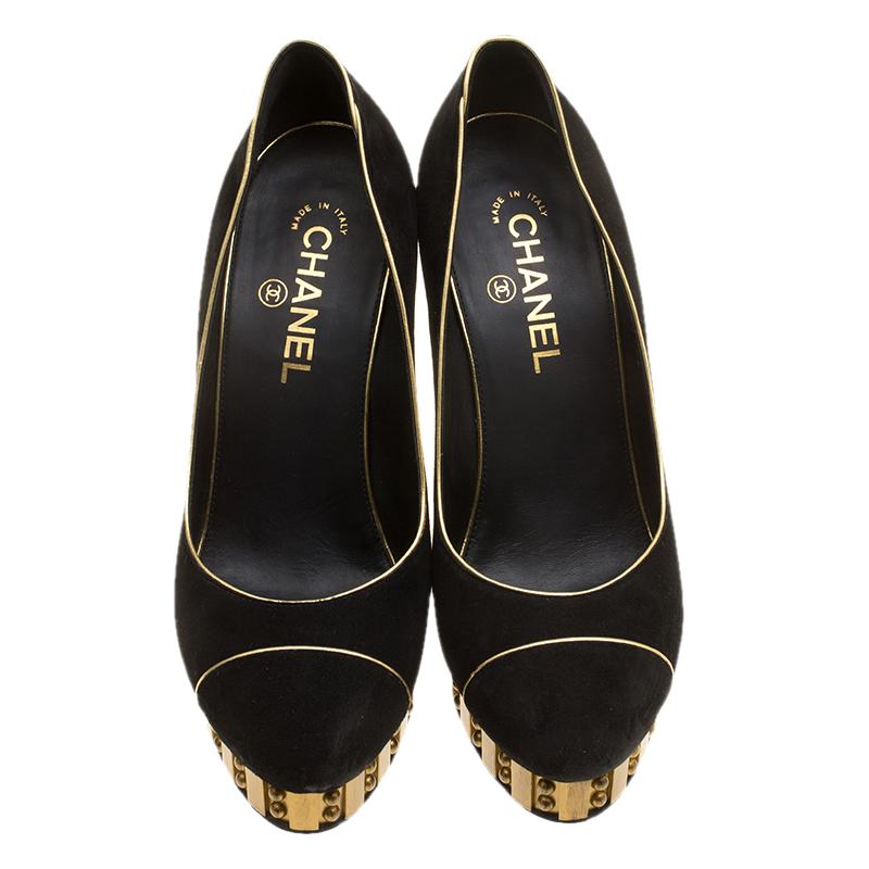 For the graceful fashionista in you, this black pair is the best pick. Feel lively inside and out, in this leather-lined pair designed by Chanel. It has a suede exterior with gold-studded 12.5 cm heels and 2 cm platforms.

Includes: Original Box,