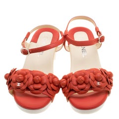 Chanel Orange Leather Camellia Embellished Ankle Strap Sandals Size 38