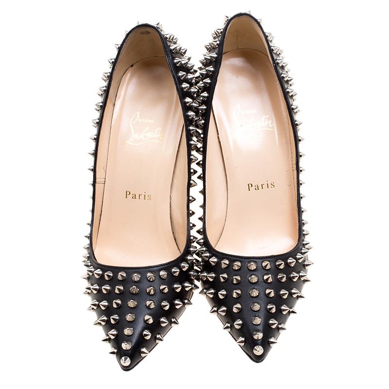 The house of Christian Louboutin brings forth a pair of chic pumps with spiked stud details over the surface area to impart an aura of premium style when paired with subtle ensembles. The premium patent red soles are accompanied with pigalle