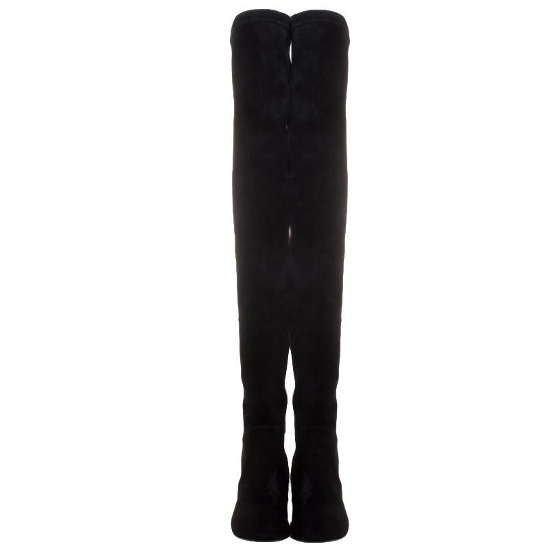 Isabel Marant's Brenna boots define the power of modern women with utter grace. Crafted in black suede, the pair is fashioned in an over the knee style, which is sure to add a dramatic touch to your look. Ideal to be worn with tights or short