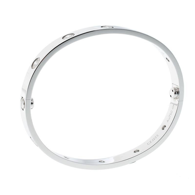 Part of the 'Love' collection. we have spotted this elegant Cartier bracelet on many celebs and models. It features a bangle style crafted from an 18k white gold and embedded with diamonds around it. The sleek pattern can be stacked with similar