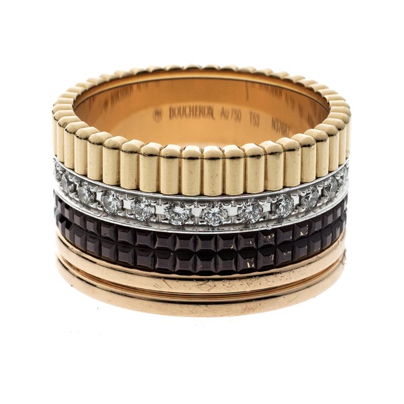 Crafted in a three-tone body, this Quatra Classique large ring from the house of Boucheron is a perfect accessory to grace any look. It features an 18k three tone gold body and a large silhouette. This ring is set with 25 round brilliant cut