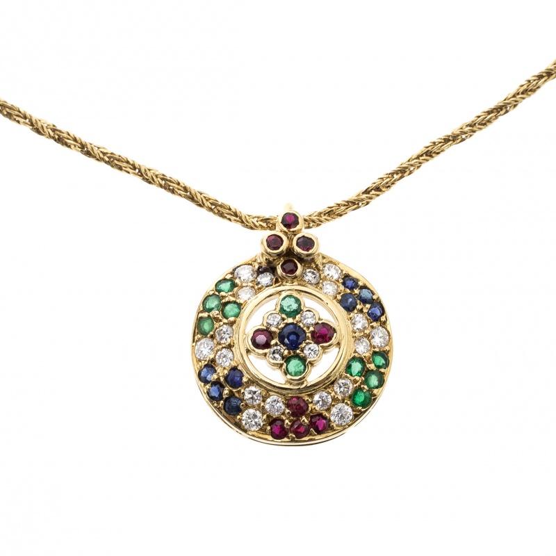 This stunning necklace from the iconic brand Chopard has a chain made from yellow gold and features a multi-gem vintage pendant. It is the perfect accessory to highlight your neckline and add a touch of feminine elegance to any outfit you wear. The
