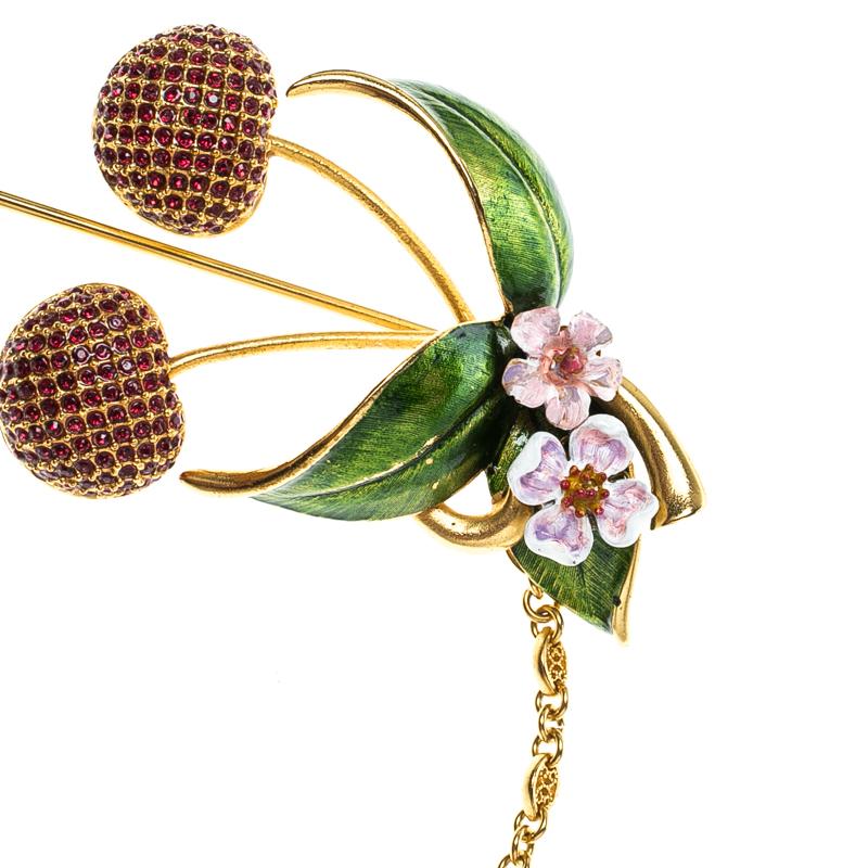 One can only expect such dainty designs from Dolce and Gabbana. Add a feminine flair to your ensemble by adorning this beautiful pin brooch from the Resort 2017 collection. Featuring cherry motif studded with crystals along with leaves and flowers