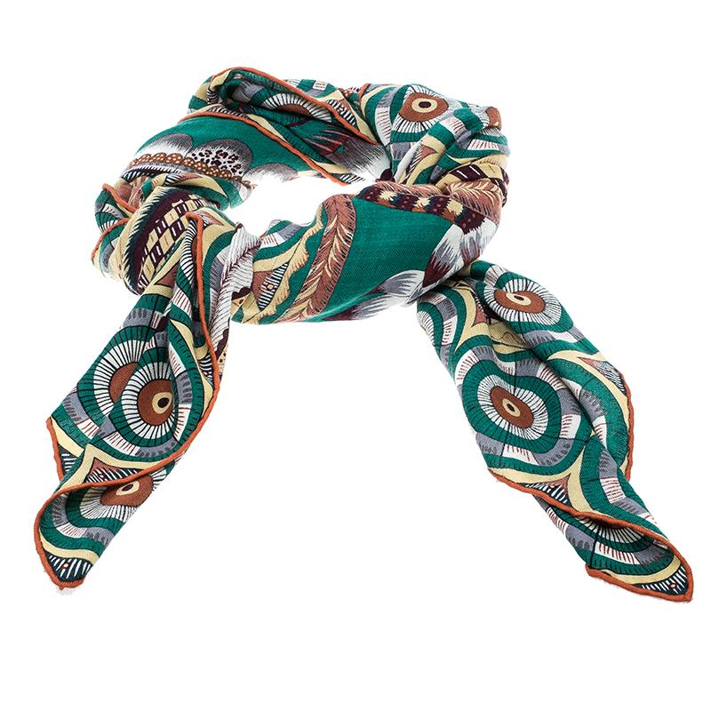 Tailored from a luxurious Cashmere and silk blend, this Hermes shawl is a beauty to add to your collection. It features a gorgeous Savana Dance print all over and finished with contrast rounded edges. Wear with a monotone blouse or dress to