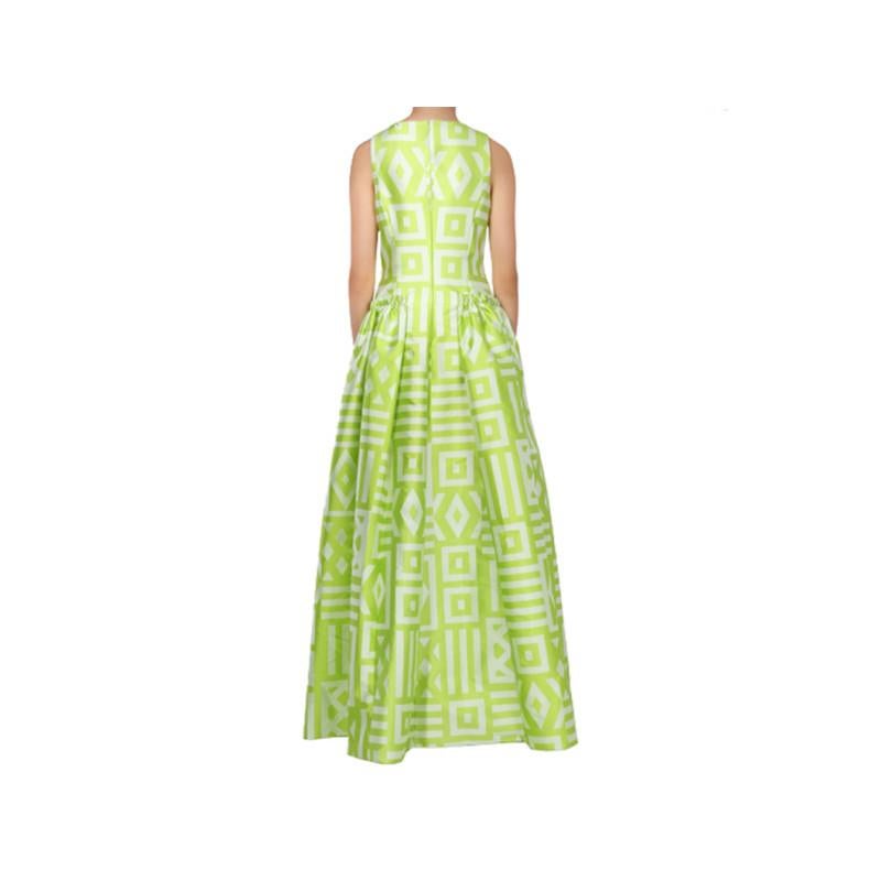 Combining fresh colors with a classic design, this SS15 Christian Siriano dress is perfect for summer weddings. Featuring a lime green and white geometric print, its simple sleeveless cut and boat neckline is coupled with a puffed skirt with small