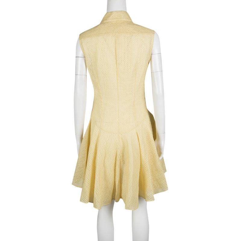 Sewn in quality cotton, this dress exudes a fuss-free, flowing style. Look ravishing in this yellow piece. Go for an Alexander McQueen dress that comes with a buttoned closure if you are looking to create an uptown and sharp look.

Includes: The