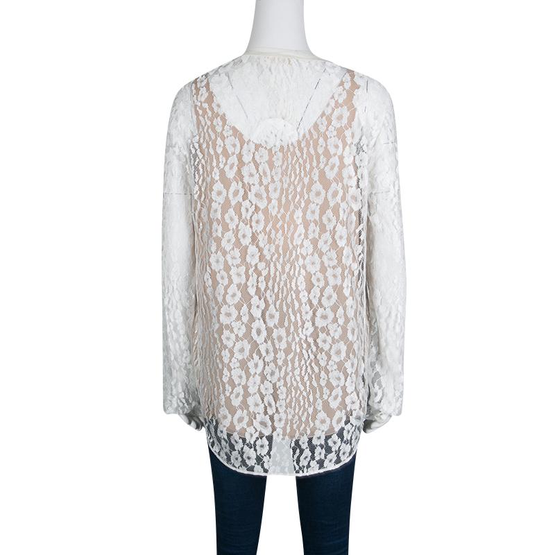 Chloe's white top echoes romantic aesthetics and a chic appeal. It is glorified with floral lace overlay and contrast lining. Lightweight and comfortable, it features long sleeves and a relaxed shape. Wear it with fitted bottoms and ballerina