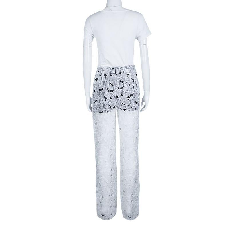 You are sure to have a good time in this lovely pair of pants. The stylish piece from the house of Peter Pilotto is made from quality blended fabrics. Designed with a flower embroidered lace body with contrast shorts underlay and pintucks on the