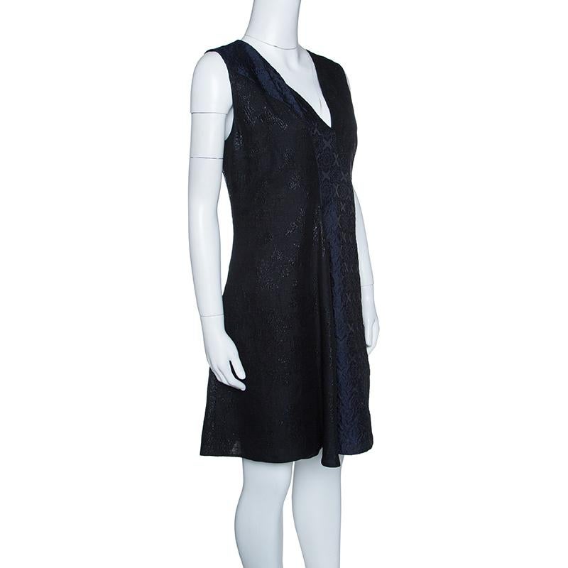 This Anita dress from Stella McCartney is a chic option for your evening look. It features asymmetric panels of navy blue cloqué and metallic jacquard and is designed into sleeveless style with a slightly flouncy shape towards the bottom. This