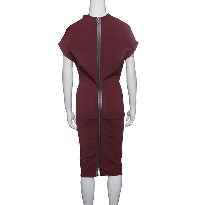 Victoria Beckham's designs are not only stylish but they're also worn by celebrities worldwide. This burgundy dress is posh and it is meant to perfectly complement a woman's body. It gives a fabulous fit and flaunts a high draped neckline and a long