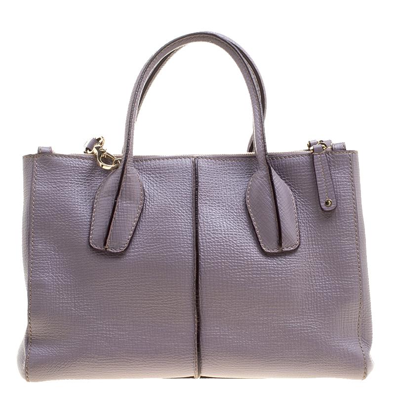 From the label of Tod's comes this lovely shopper tote that has been finely crafted from leather. It features double rolled handles, an adjustable shoulder strap and a spacious fabric interior to house your belongings.

Includes: The Luxury Closet