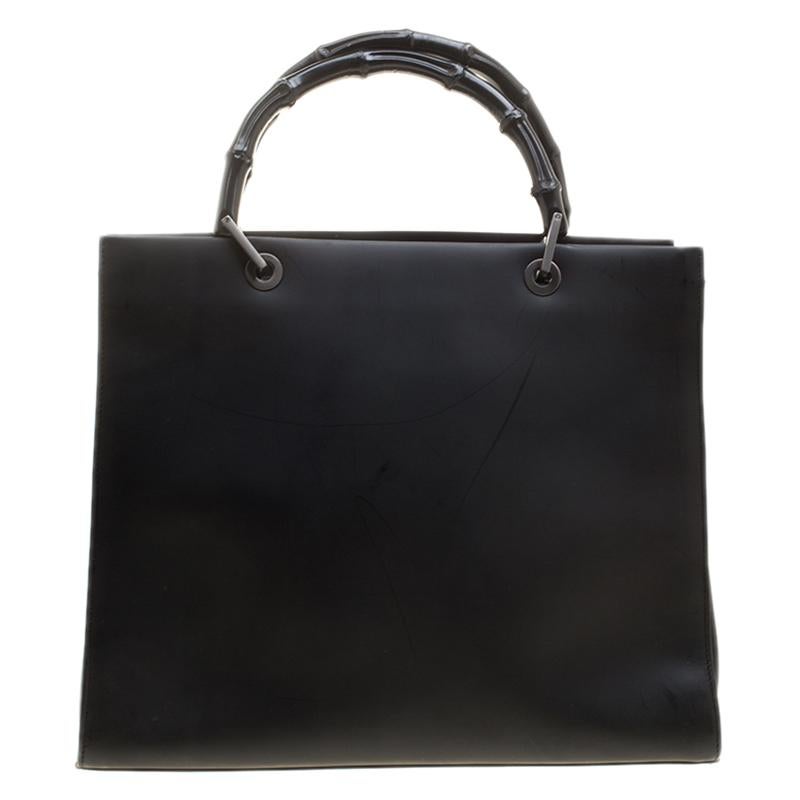 An epitome of style, this beautifully crafted tote comes with highly durable nylon interiors. This classy leather piece from Gucci will surely catch your attention instantly. The black color helps it complement all your ensembles while the bamboo