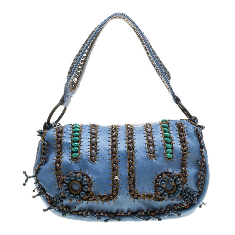 A must-have for every modern lady is this lively blue leather handbag having best quality fabric lining. An example of quality craftsmanship, this Jamin Puech creation can work well for any occasion. Step out with this and turn heads around