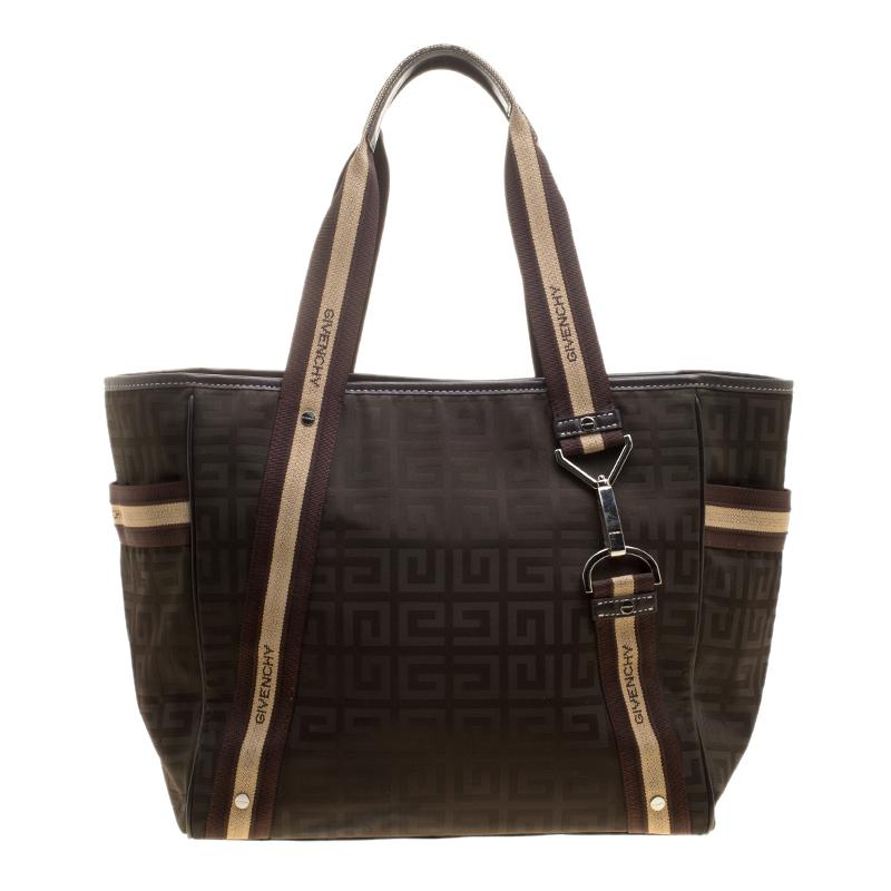 Made with signature nylon, this tote makes an impressive addition to any stylish ensemble. It has two handles and a spacious interior for your needs. Carry it with style and this Givenchy piece will surely fetch you many second glances.

Includes: