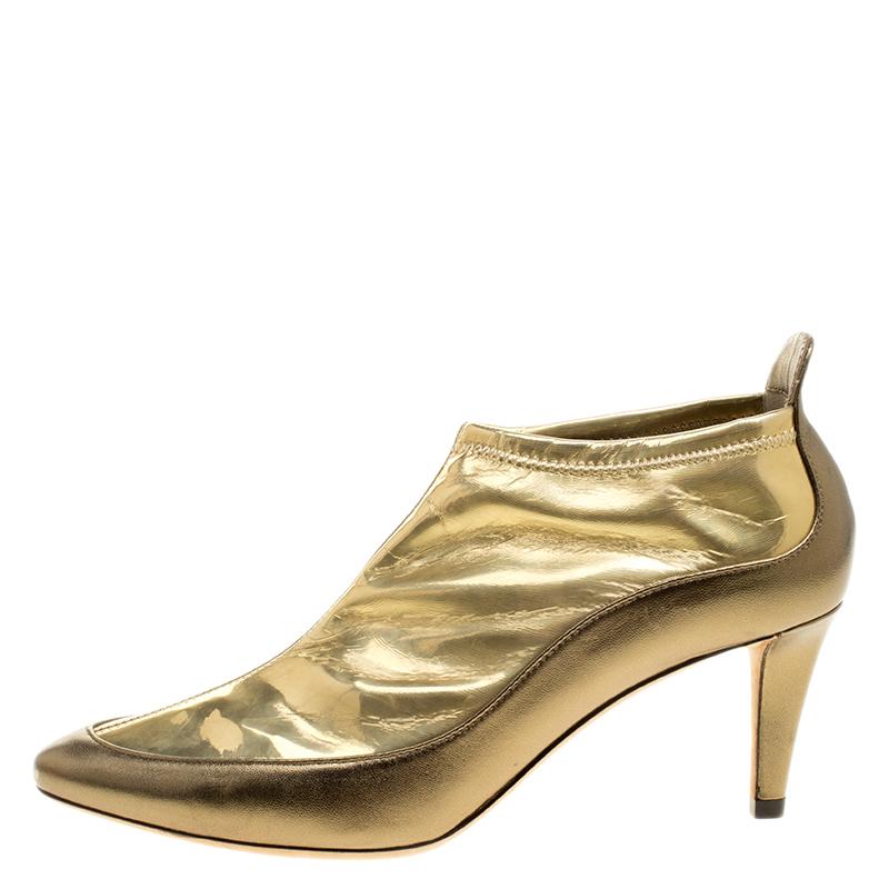 Jimmy Choo Metallic Gold Leather and PVC Dierdre Ankle Boots Size 37 In New Condition In Dubai, Al Qouz 2