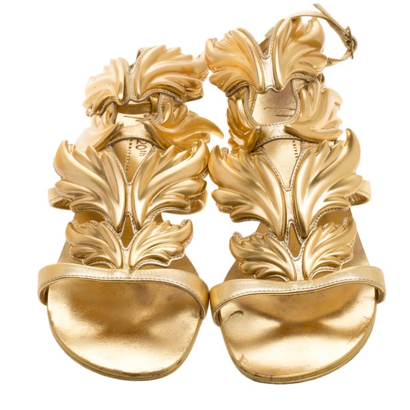 Giuseppe Zanotti's designs are not only well-crafted but also breathtaking. Take a look at these stunning Cruel Summer Wing sandals from their 20th Anniversary Jewel Edition! Crafted from metallic gold leather and styled with open toes, this pair