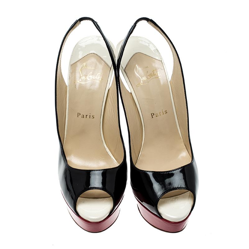 These classic Lady Peep-toe from the house of Christian Louboutin is that versatile pair that you can wear with many of your outfits. It features a tri-color patent leather body, set on an extremely low platform sole and features a comfortable heel.