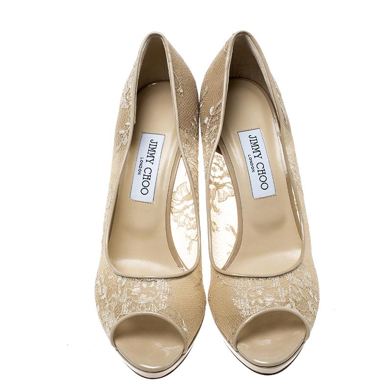 Jimmy Choo has come out with yet another pair of simple yet contemporary pumps. The pumps are covered in beige lace and designed with peep toes, thin platforms and 11 cm heels. Elevate your polished look by slipping into this pair.

Includes:
