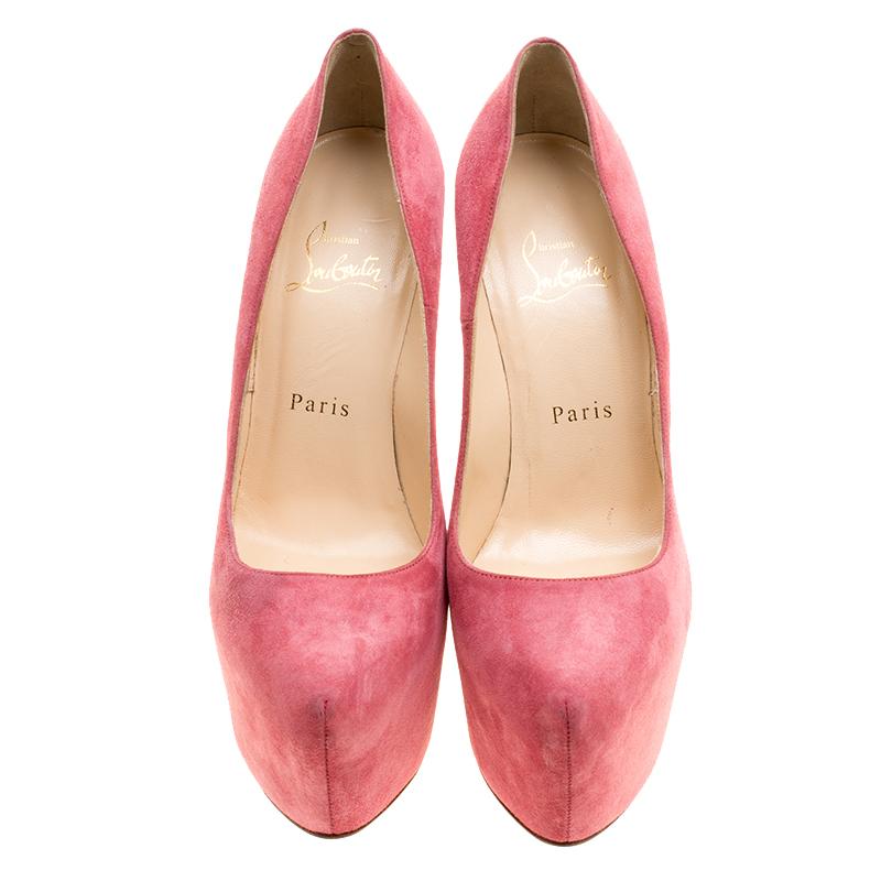 This pair of pumps designed by Christian Louboutin is exactly what you want. Prepared from pink suede, the leather-lined insoles proivde a chic touch to the heels. Look joyful in this pair designed with covered platforms and stiletto heels. Add a