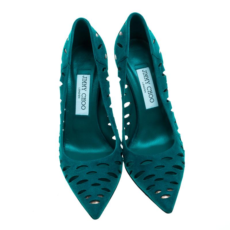 These Talka pumps by Jimmy Choo are not just stylish; they speak elegance in a nonchalant way. Crafted from teal coloured suede, they are adorned with mesmerising cutout motifs all over. They have gold-tone hardware detailing at their fronts and