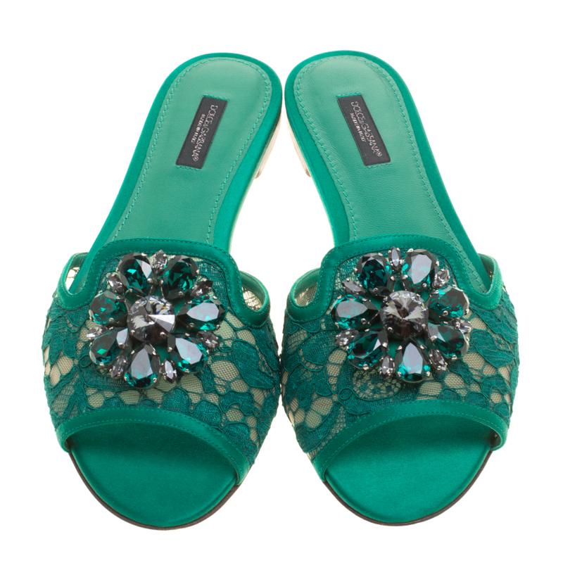 These Dolce&Gabbana slides are made with satin, lace, and mesh, while the insoles are lined with leather. What makes these slides so desirable are the breathtaking crystals embellished on the vamps. This is definitely one pair that speaks beauty in