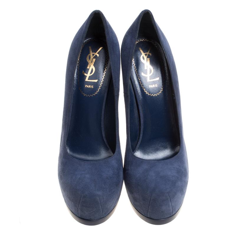 Fashionable and chic, these Tribtoo pumps from Saint Laurent will add beauty and style to your closet. Crafted from suede, the pumps have a blue shade, concealed platforms, and 14 cm heels.

Includes: Original Dustbag

