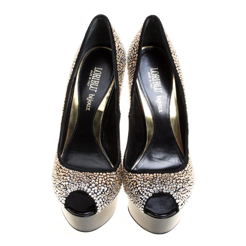 Command attention and admirable gasps from your audience with each step you take in these Bijoux pumps from Loriblu. Crafted from suede, these black beauties feature crystal embellishments all over while the platforms are detailed with leather
