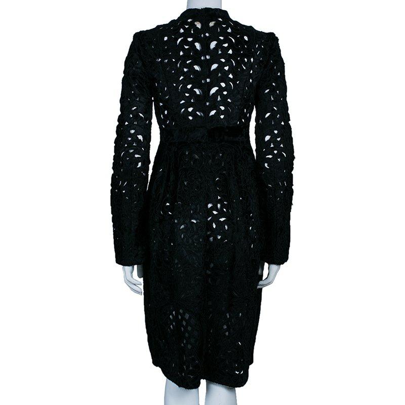 Get the ultimate chic finish when you put on this Valentino black coat. Crafted from 100% moire lamb with pony hair accents, this coat features cut out details all over and a belt that forms an adorable bow at the front.

Includes: The Luxury Closet