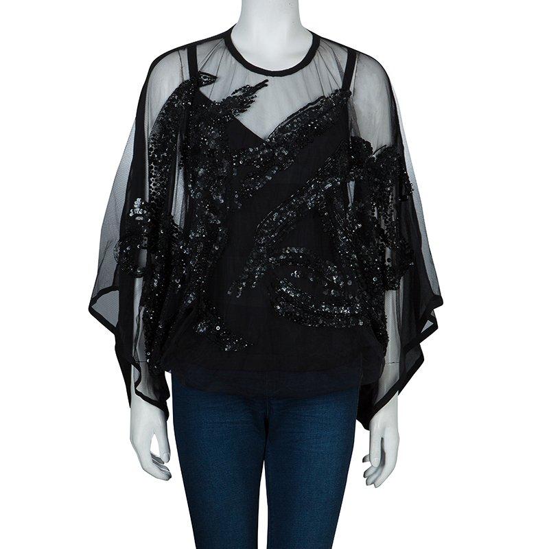 This party perfect and prepossessing mesh overlay top by Elie Saab is sure to win you those boundless looks. Crafted from a polyamide and silk blend, it features a round neckline and impressive sequin embellishments. This top is accentuated with a