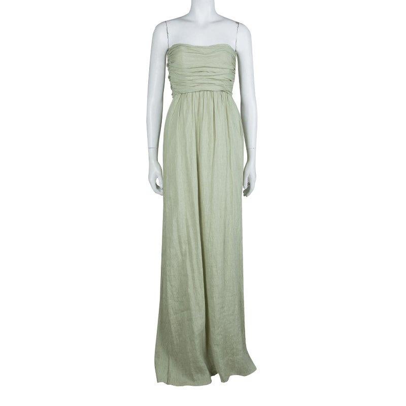 This Maxi dress by Alberta Ferretti is an alluring and elegant apparel. Crafted from linen and polyester blend, this strapless dress features ruched details along with soft pleated details. It is a perfect apparel for evening parties.

Includes: The