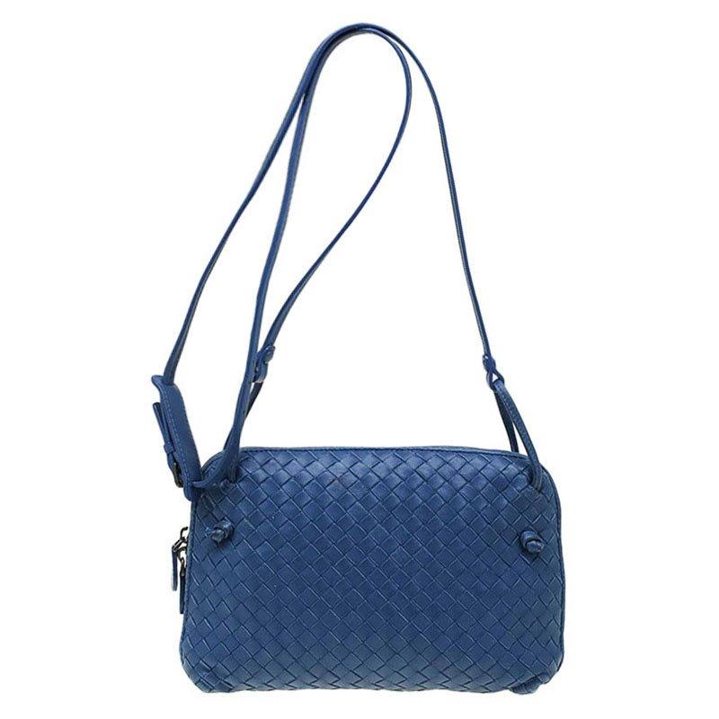 Bottega Veneta has been redefining fashion and setting a new standard of luxury. This crossbody bag from the label is made with blue Nappa leather featuring the label’s signature Intreciatto weave. It has a long, adjustable shoulder strap and a zip