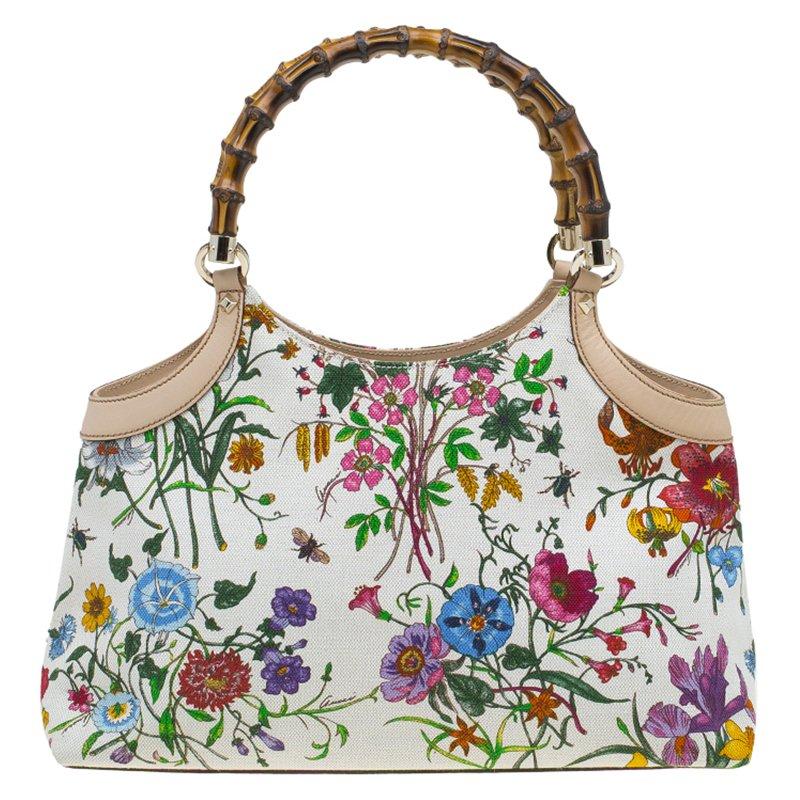 One of Gucci's unique creations, this bamboo tote is also one of the most in-demand bags. Flawlessly designed in flora canvas, this tote comes with the brand's iconic bamboo top handles. The open-top style can conveniently hold your day to night