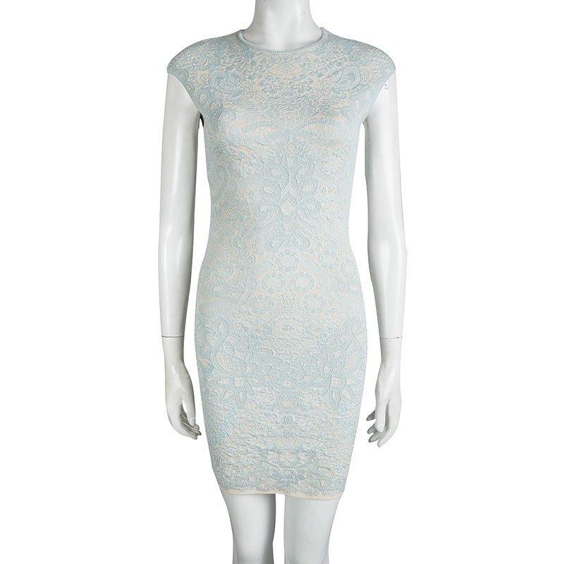 Slim, sleeveless and sophisticated –this powder blue mini dress from Alexander McQueen is elegance itself. The neat herringbone design on the round neck and sleeves complements the jacquard knit pattern of the dress. Wear this dress with high heels