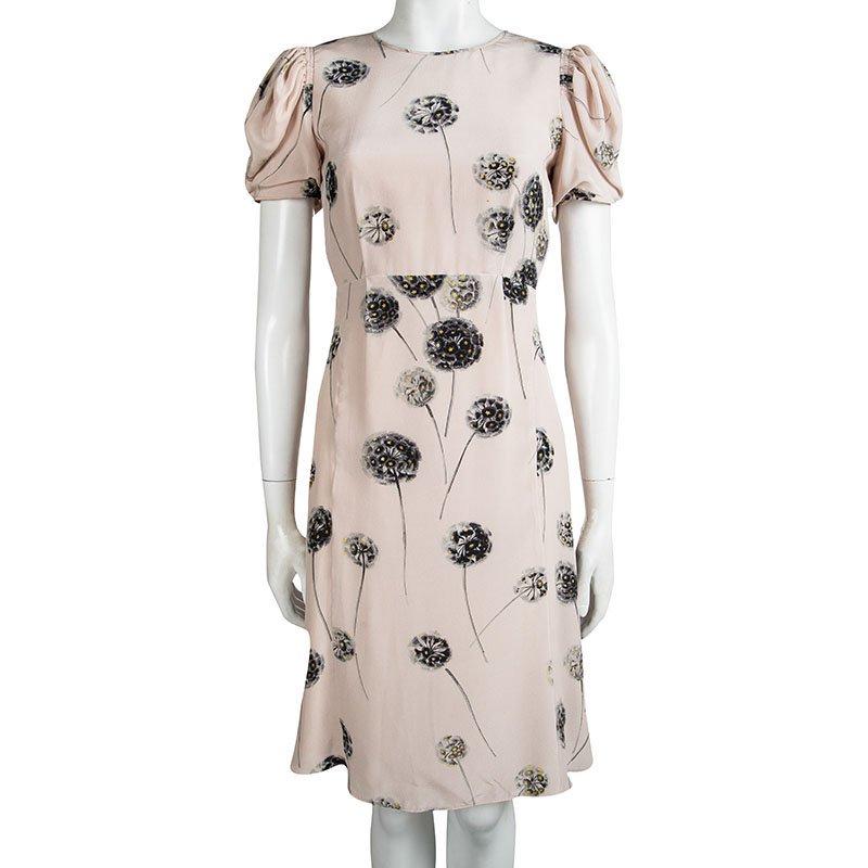 From Runway shows to Red carpet looks, Valentino creations has owned the fashion world there's no tomorrow. This chic and summery dress from the house is fashioned in a pastel pink hue with striking floral print all over. Cut from soft silk, this